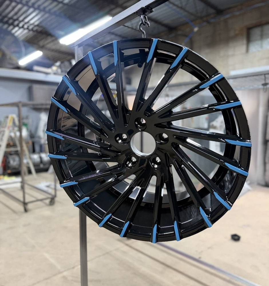 Gloss black with blue accents