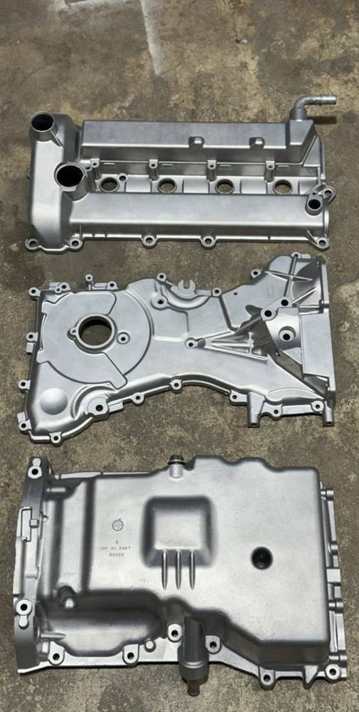 Valve cover, timing cover, and oil pan after