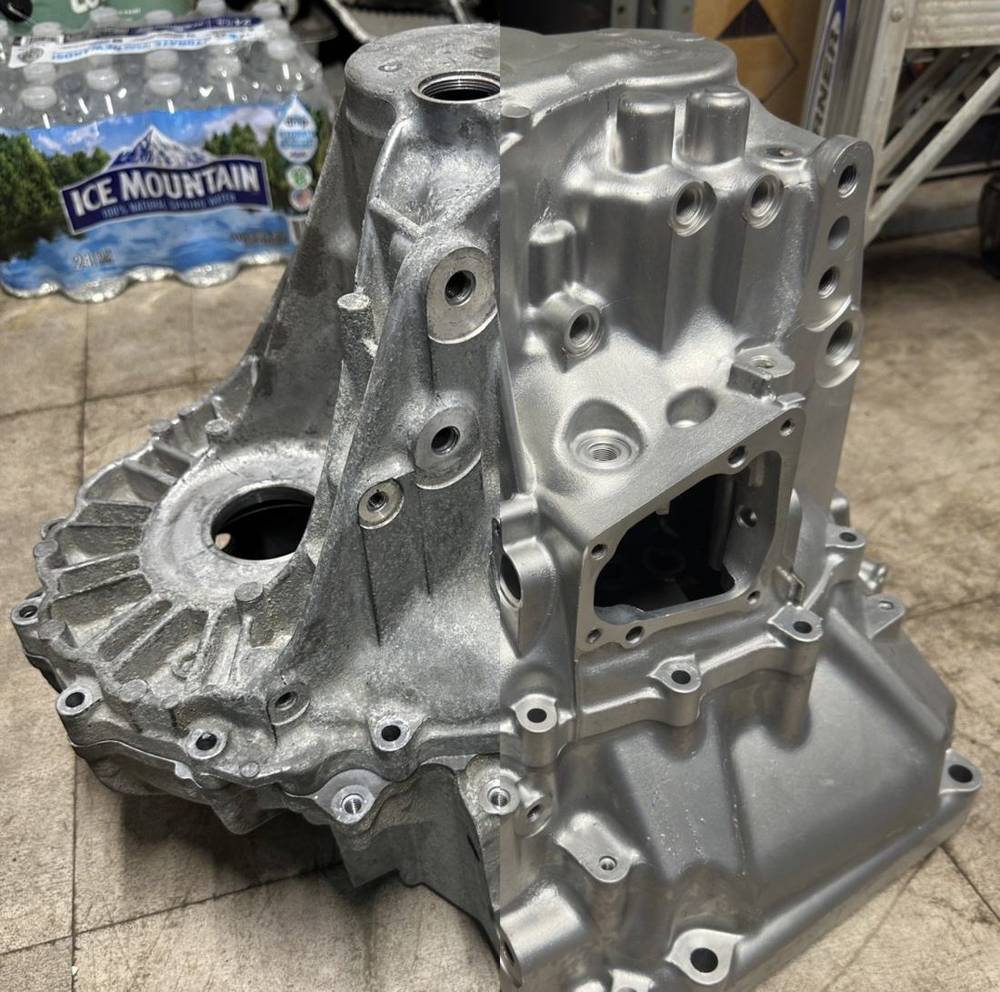 Transmission case before and after vapor honing